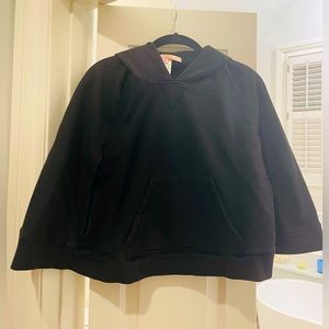 Child’s black hooded poncho